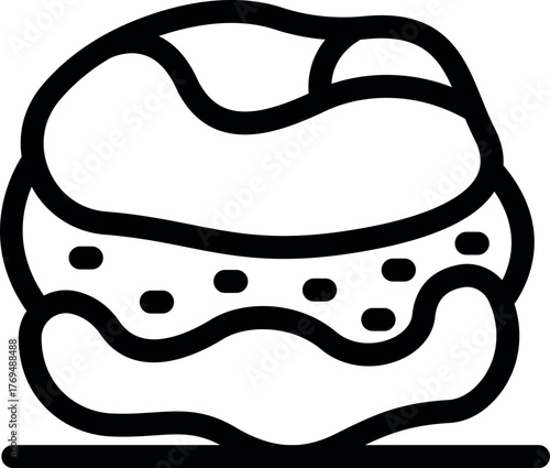 Sweet french macaron with cream and sprinkles is waiting to be eaten