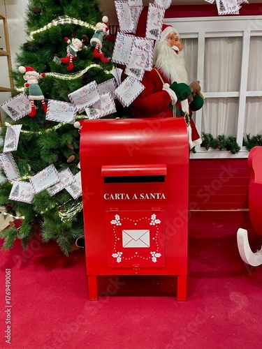 Traditional red mailbox for letters with Spanish text, symbol of communication and nostalgia.