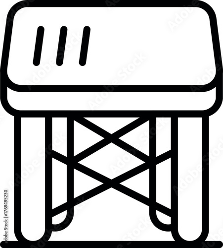 Folding camping table standing on grass, perfect for outdoor activities