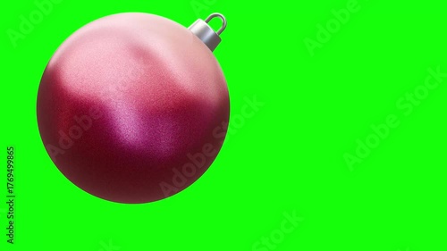 realistic three-dimensional rendering of balancing red glitter christmas ornament ball seamless looping animation on green screen background