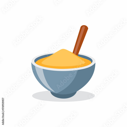 Blue bowl filled with yellow powder and a brown spoon for cooking or baking ingredients