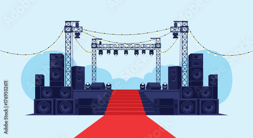 A large outdoor stage for a concert or event, featuring a red carpet, speakers, and lighting, with a background of blue sky and clouds.