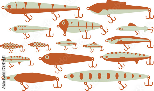 Various colorful fishing lures arranged on a pink background surface