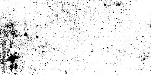 White and black grainy grunge overlay texture with dust effect, old and dusty grainy grunge Abstract black particulate explosion on white.