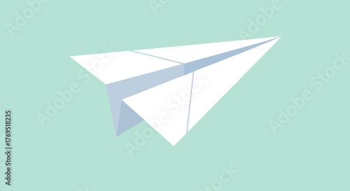 Simple white paper airplane soaring through the air ready to fly.