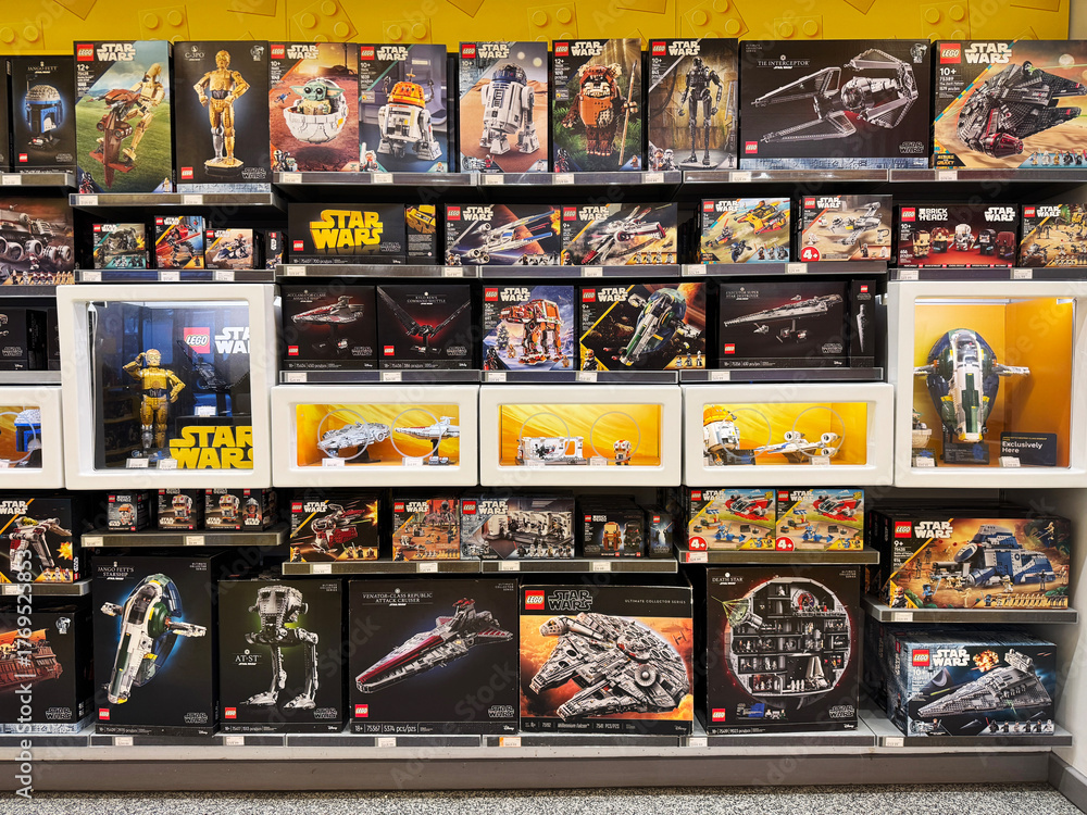 Naklejka premium Variety of Star Wars Lego sets on sale at a Lego store.