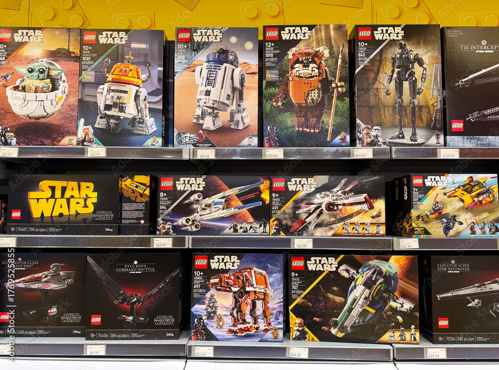 Naklejka premium Variety of Star Wars Lego sets on sale at a Lego store.