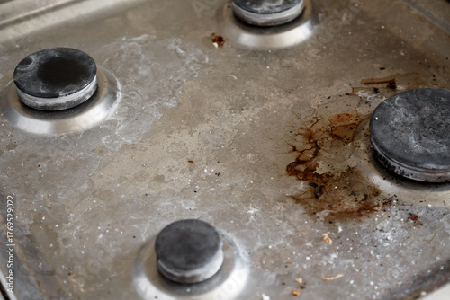 Photography Dirty gas stove with stains and grease before cleaning process