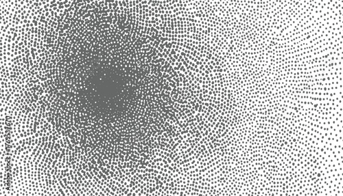 monochromatic pattern of gray dots on white background with gradient effect.