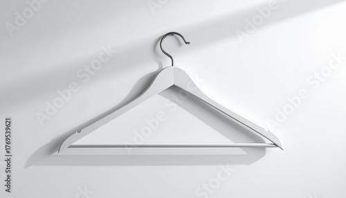 Minimalist White Wooden Clothes Hanger on White Wall