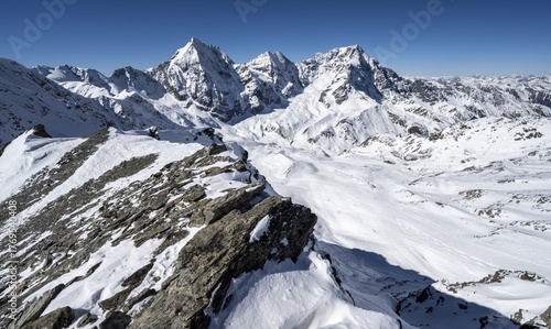 Mountain panorama with snow-covered mountain landscape in winter, view of mountain peaks Königsspitze, Monte Zebru and Ortler, summit of Madritschspitze, Ortler Alps, Vinschgau Valley, Italy