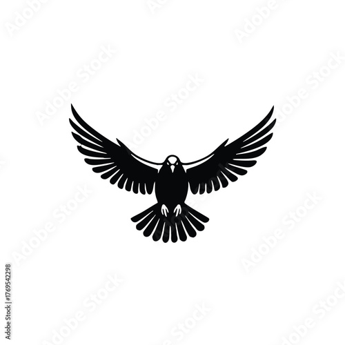 Stylized black bird in dynamic flight, wings spread, a powerful symbol of freedom and peace isolated on white background