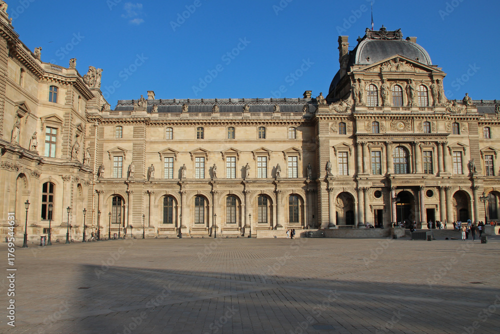 Fototapeta premium old stone palace (le grand louvre) in paris in france 
