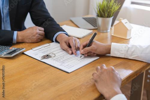 Konstfotografi Asian tenant, client man sign signature contract rental purchase, buyer home or apartment with landlord, realtor after banker agreement mortgage, loan success or done