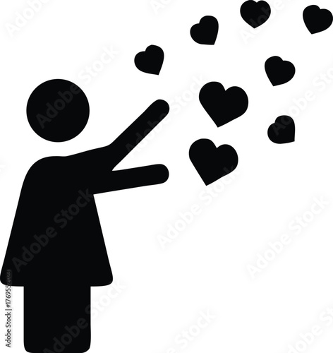 Silhouette of a person releasing hearts into the air symbolizing love and affection