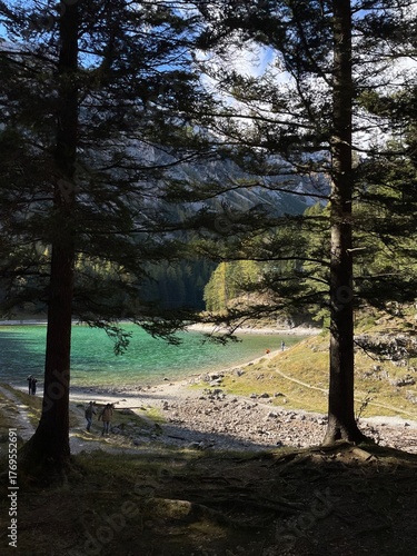 Grüner See in Austria, sparkling in the autumn sunshine, surrounded by mountains, forests and clear water