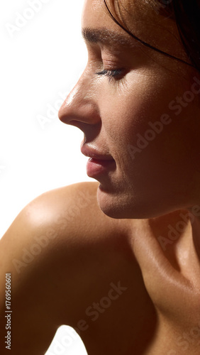 Wallpaper Mural Profile of young woman with radiant skin and calm emotion in soft light. Concept of wellness self care, mental health balance, natural lifestyle eco, and beauty skincare. Torontodigital.ca