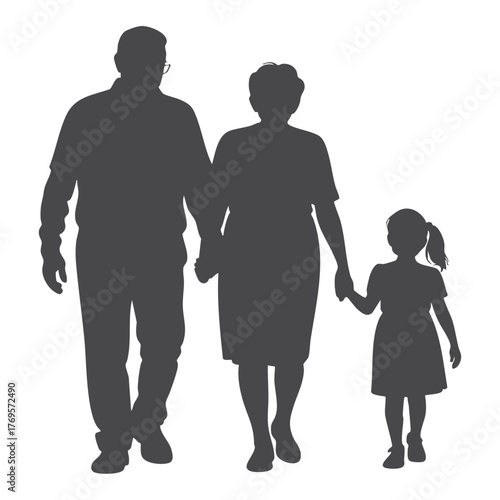 Family walking together holding hands grandparents and granddaughter silhouette