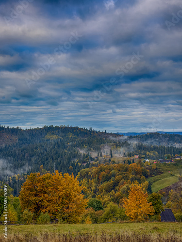 Misty Autumn Rain Clouds over Ukrainian Carpathian Mountains.