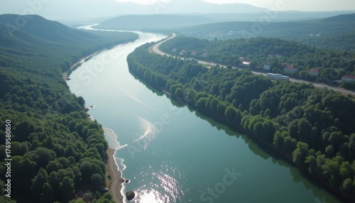 Wallpaper Mural Aerial view of a winding river lush forests landscape photography serene environment scenic angle natural beauty Torontodigital.ca
