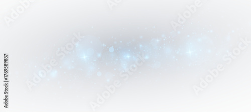 Festive background with sparkling dust and blue stars.