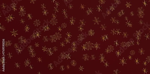 Abstract background of golden snowflakes on a burgundy red surface, ideal for Christmas or winter holiday designs. Use it for festive themes and