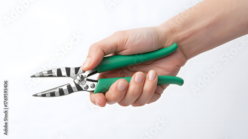 Hand holding key and small house symbolizing success and opportunity