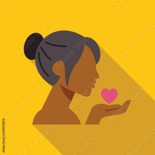 Profile of a kind young woman holding a heart, a symbol of love, care, and affection, promoting kindness and compassion