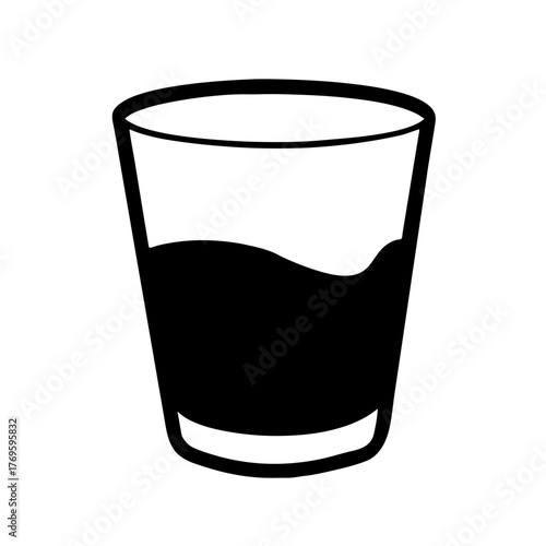 glass filled with a dark liquid