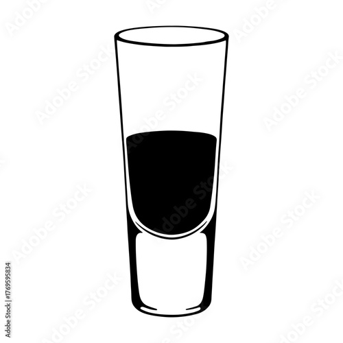 shot glass filled with a dark liquid