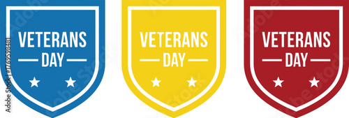 Three veterans day badges in blue yellow and red on a white background