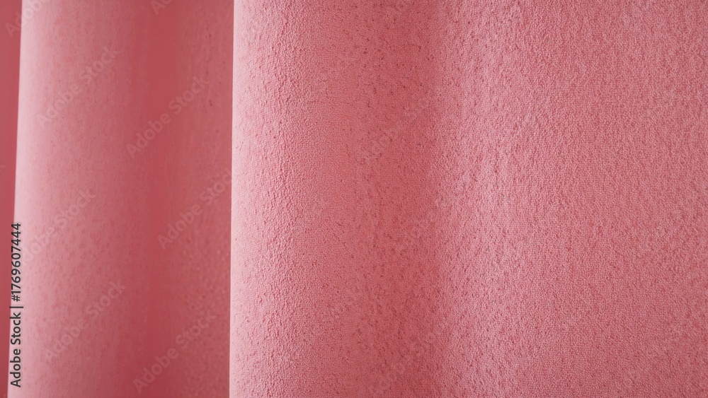 Fototapeta premium Closeup of pink velour curtain textured background for design purpose