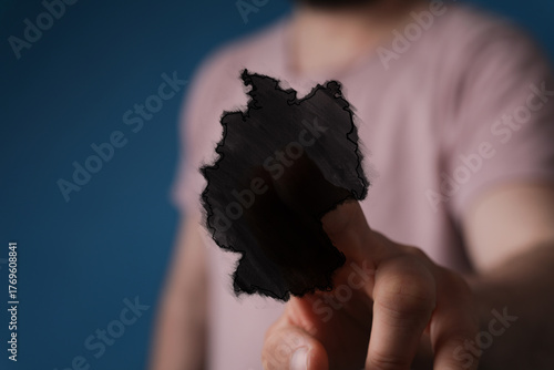 Close-up of a hand holding ...