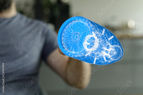 An engineer presents a blue...