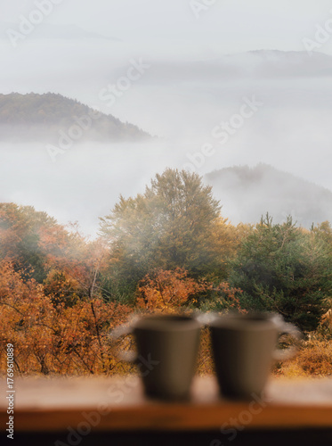 Foggy Autumn Morning with Two Coffee Cups