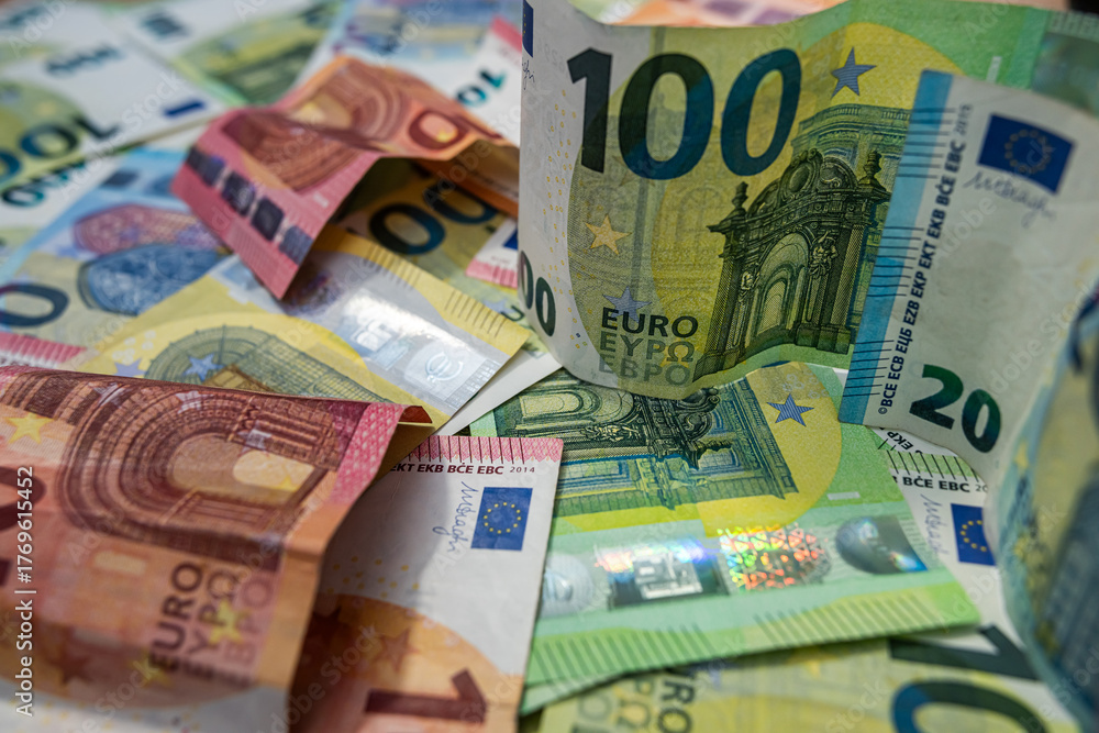 Obraz premium Euro banknotes background, concept of wealth, finance, investment and European economic stability