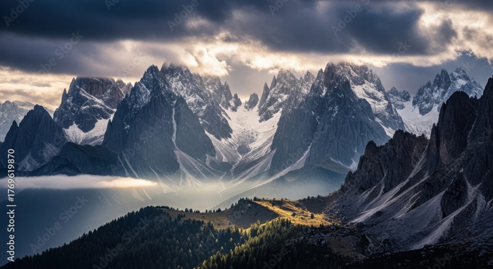 Obraz premium Dramatic Snow-Capped Mountain Range Landscape with Sun Rays and Cloudy Sky isolated on White Background