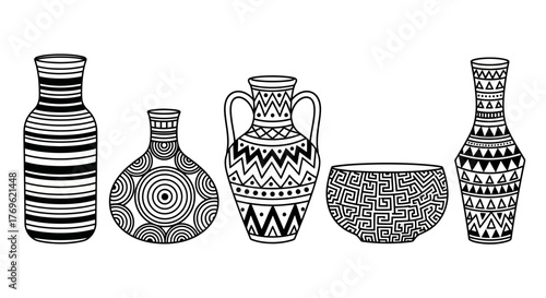 A collection of decorative black and white patterned ceramic vases