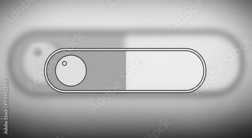 Monochrome toggle switch in the off position on a gray background