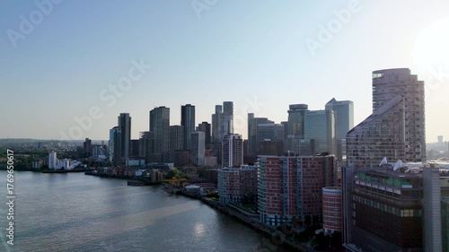 Wallpaper Mural Aerial panoramic view of the skyline over the Thames at sunset. Modern skyscrapers reflecting the golden light of London’s financial district.
 Torontodigital.ca