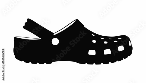 Black silhouette of a single casual clog shoe with strap and ventilation holes on white background footwear.
