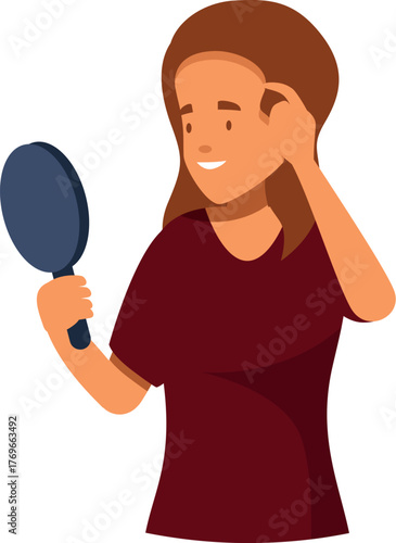 Young woman holding a hand mirror and fixing her hair, getting ready