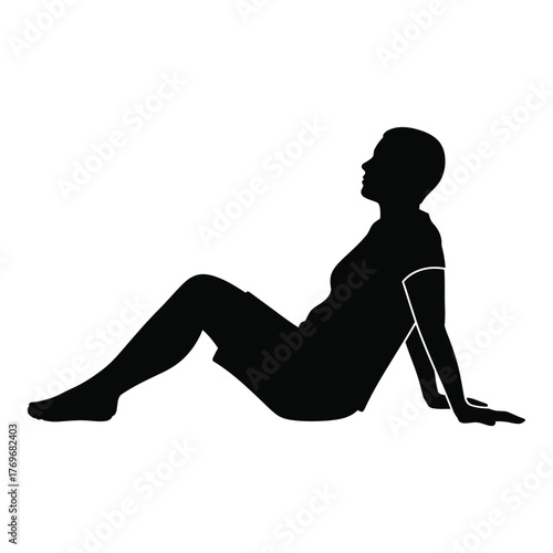 Silhouette of a person sitting backwards with legs extended relaxing and resting peacefully silhouette