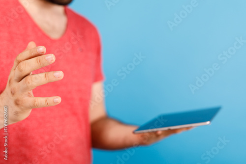 Close-up of a man holding a...