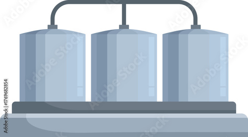 Three connected metal industrial tanks storing chemicals or other liquids in a processing plant
