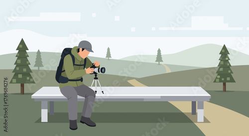 Photographer Readying His Equipment On A Bench In A Natural Landscape For Work
