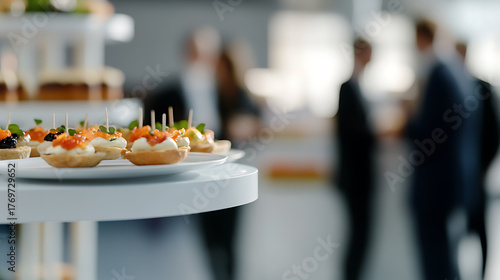 A platter of appetizers offers a refined culinary experience at a sophisticated social event. The catered delicacies add elegance to the gathering with style.