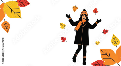 Joyful child in warm winter clothes tossing colorful autumn leaves in the air