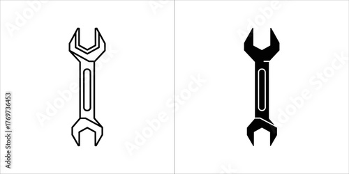 Two wrench icons, one outlined and one solid black