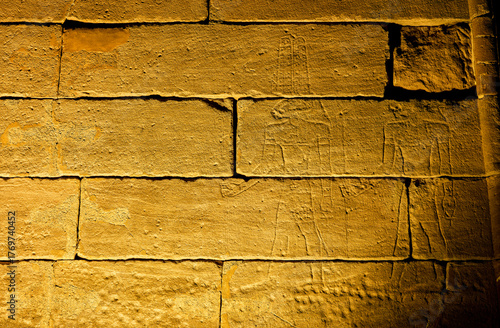 Wallpaper Mural A sunk-relief depiction of the gods Amun of Debod and the lion god Maahes on the west facade of the Temple of Debod. Madrid, Spain. Torontodigital.ca